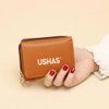 Imagen de Billetera con bolsillo frontal Ushas