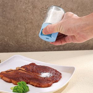 Imagen de Salero de vidrio tapa color con boton dispensador