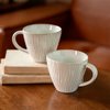 Imagen de Taza ceramica brilloso blanco 10,5x9cm.-exterior ondeado