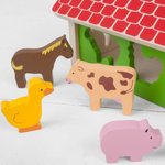 Imagen de Casa Granja de encastre y clasificación en madera Bigjigs