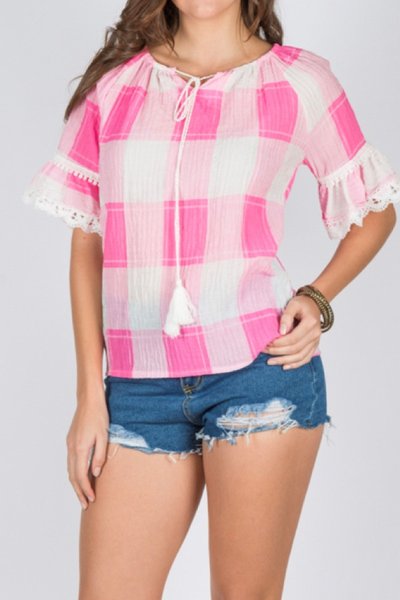Imagen de BLUSA AMPLIA C/ BORLAS EN ESCOTE